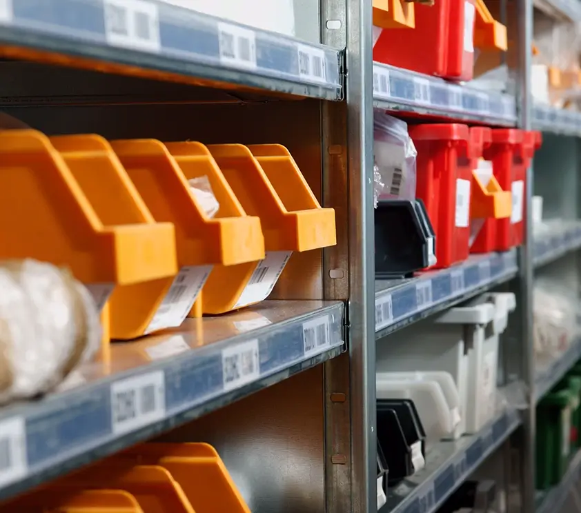 Yellow parts bins in warehouse